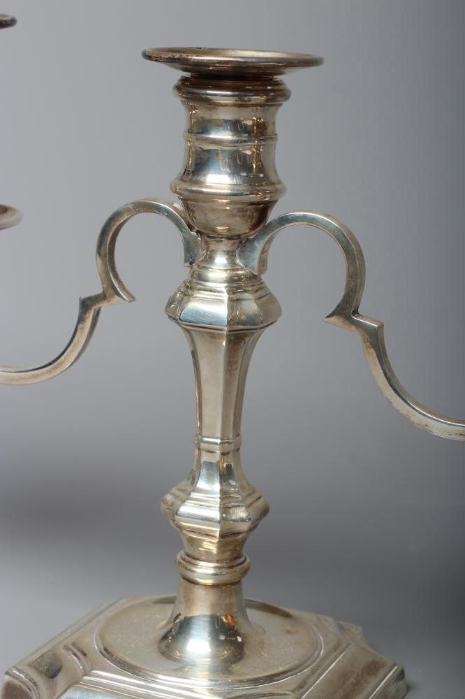 A PAIR OF ELIZABETH II TWO BRANCH THREE LIGHT CANDELABRA by Barker Ellis Silver Co. Image