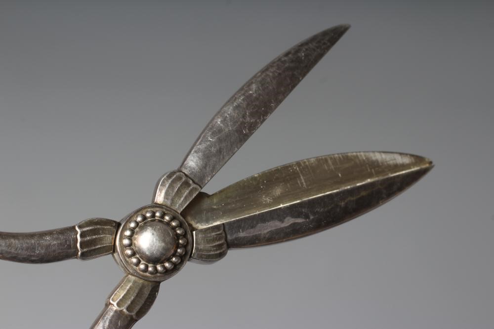 A PAIR OF GEORG JENSEN SILVER GRAPE SCISSORS, London import mark 1997, cast with two bunches of Image