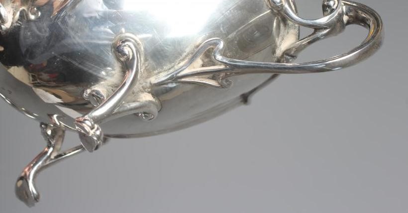 A GEORGE V SILVER ART NOUVEAU THREE PIECE TEA SERVICE by James Deakin & Sons Image