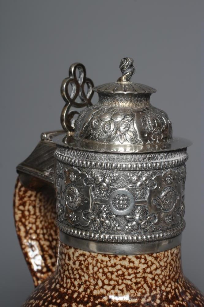 A SILVER MOUNTED REPRODUCTION TIGERWARE STONEWARE JUG by Nathan & Hayes Image