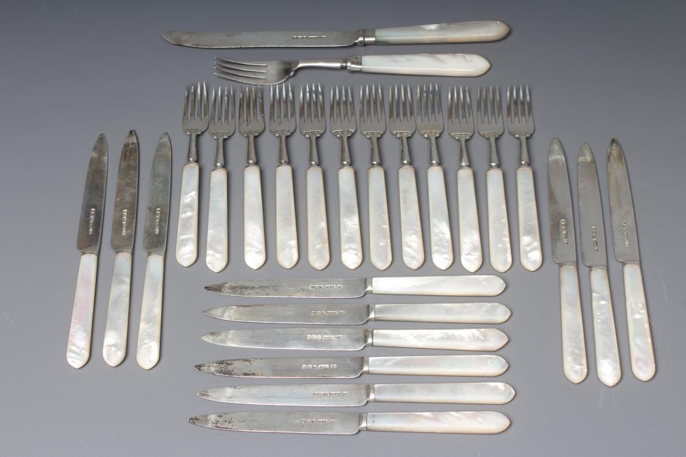 A GEORGE V SILVER SET OF TWELVE PAIRS OF FRUIT KNIVES AND FORKS Joseph Rodgers & Sons Image