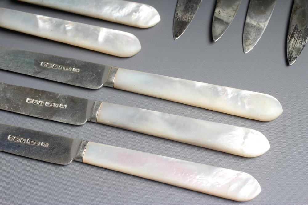 A GEORGE V SILVER SET OF TWELVE PAIRS OF FRUIT KNIVES AND FORKS Joseph Rodgers & Sons Image