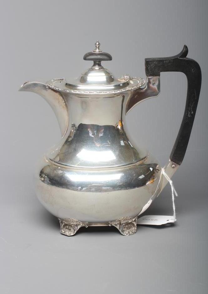 AN EDWARDIAN SILVER SMALL COFFEE POT by Walker & Hall Image