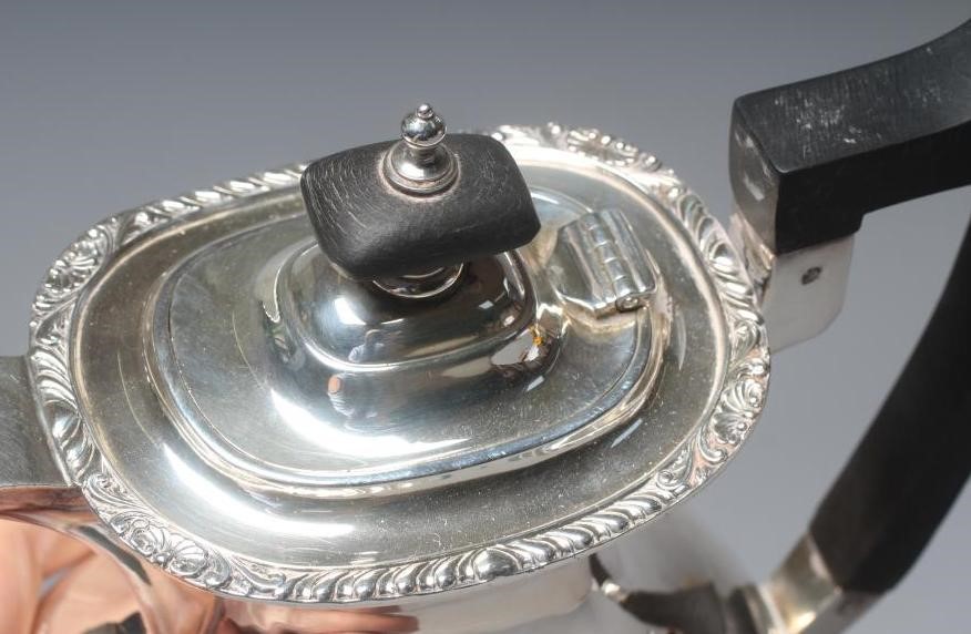 AN EDWARDIAN SILVER SMALL COFFEE POT by Walker & Hall Image
