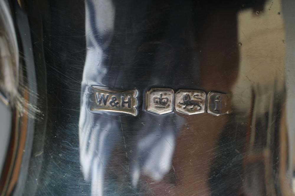 AN EDWARDIAN SILVER SMALL COFFEE POT by Walker & Hall Image