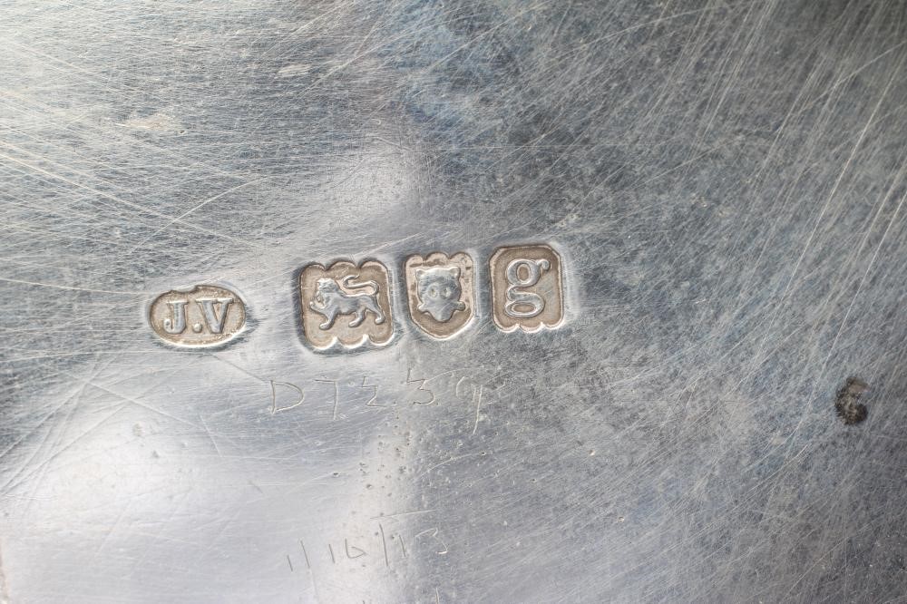 AN EDWARDIAN SILVER SALVER by Cornelius Joshua Vander Image