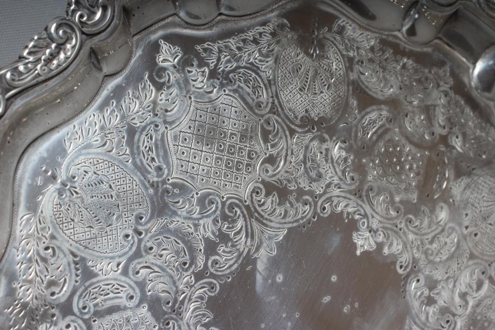 AN EDWARDIAN SILVER SALVER by Mappin & Co. Image