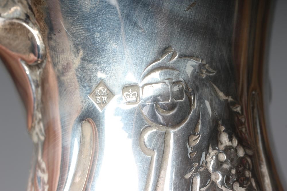 A LATE VICTORIAN SILVER HOT WATER JUG by Martin Image