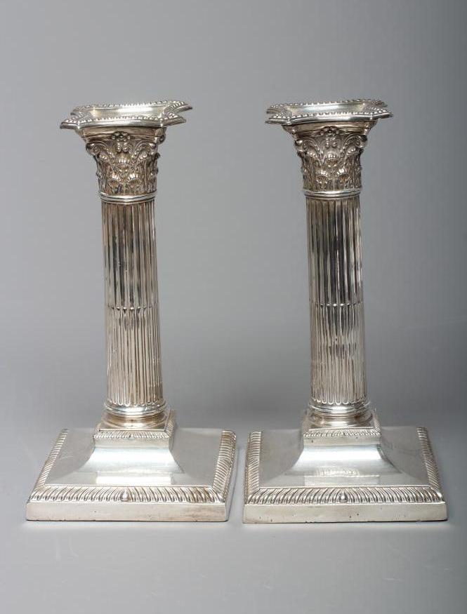 A PAIR OF LATE VICTORIAN SILVER CORINTHIAN COLUMN CANDLESTICKS by Jenkins & Timm Image