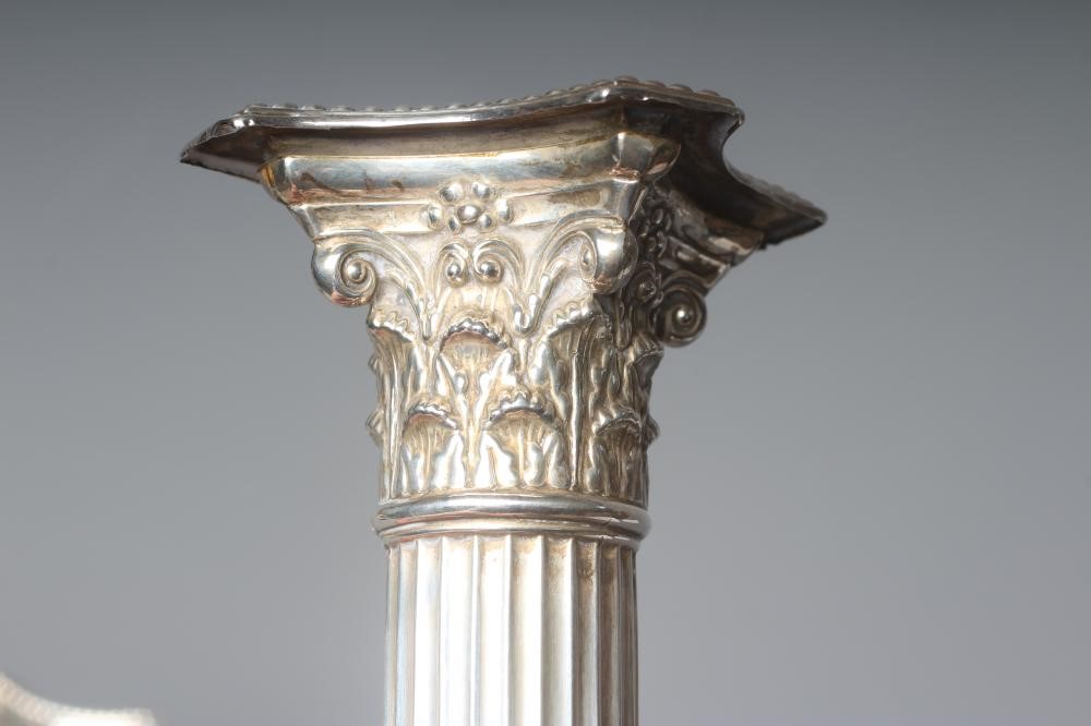 A PAIR OF LATE VICTORIAN SILVER CORINTHIAN COLUMN CANDLESTICKS by Jenkins & Timm Image
