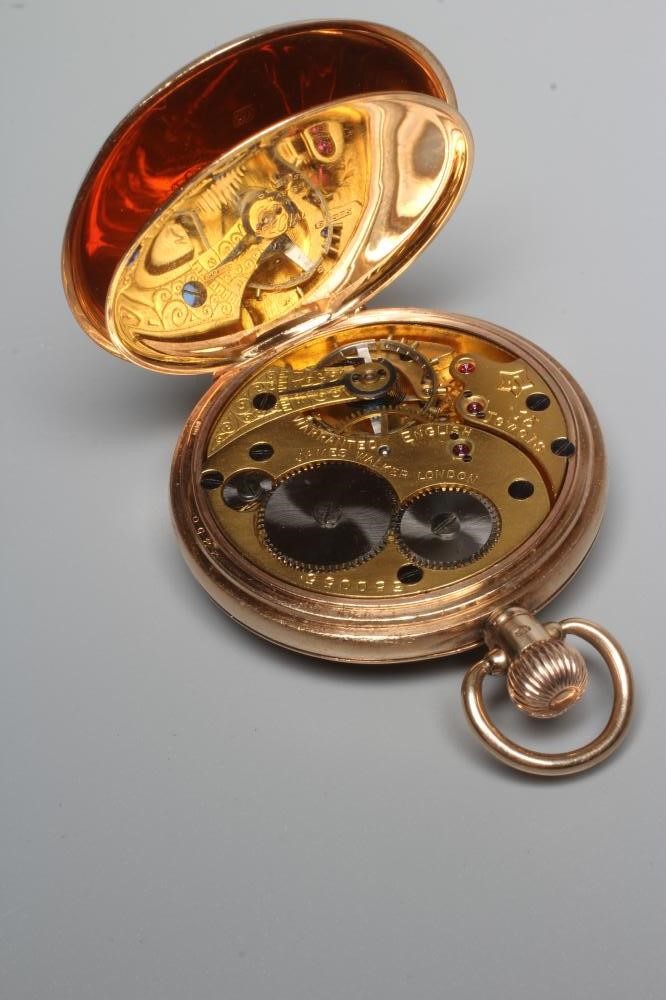 A 9CT GOLD TOP WIND HALF HUNTER POCKET WATCH by James Walker Image
