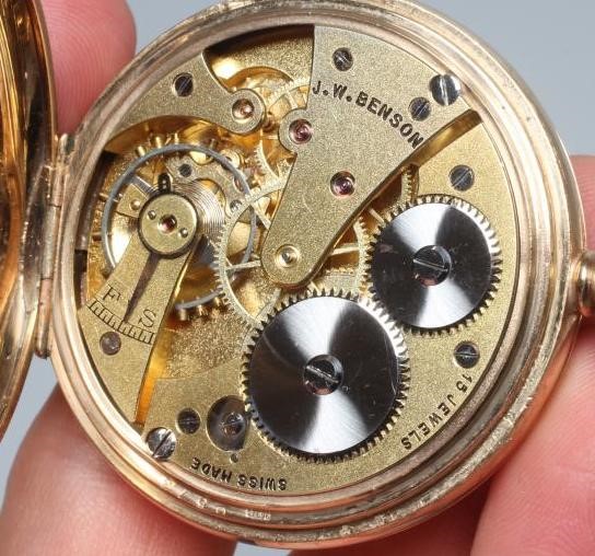 A 9CT GOLD TOP WIND HALF HUNTER POCKET WATCH by JW Bensen Image