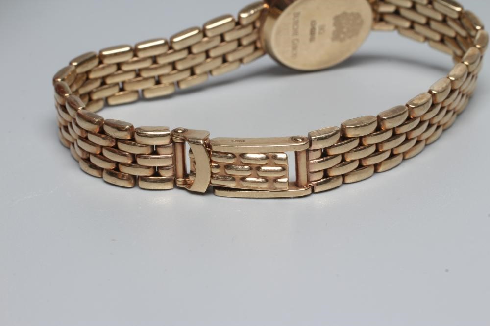 A LADY'S 9CT GOLD BUECHE GIROD WRISTWATCH Image