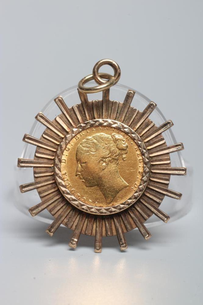 A VICTORIA YH SOVEREIGN, 1872, in a 9ct gold sunburst pendant loose mount, 14.1g gross (Est. plus Image