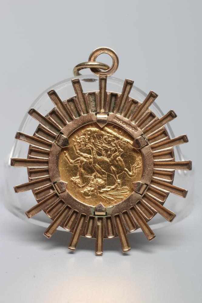 A VICTORIA YH SOVEREIGN, 1872, in a 9ct gold sunburst pendant loose mount, 14.1g gross (Est. plus Image