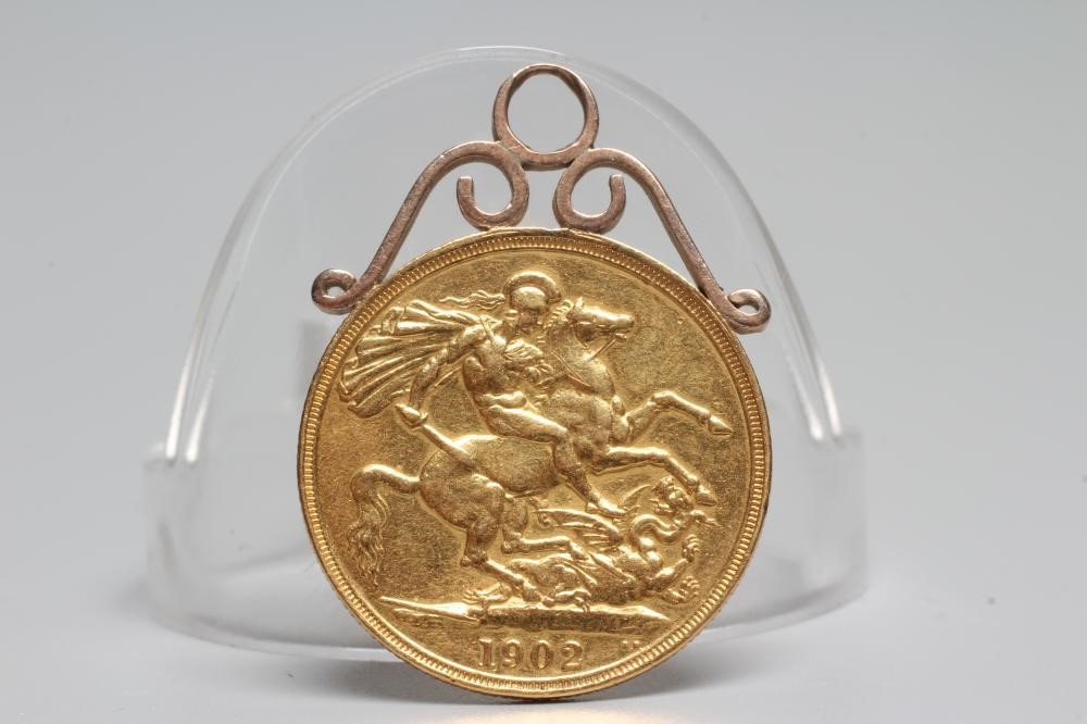 AN EDWARD VII GOLD £2, 1902, in a wirework pendant hard mount, 17.1g gross (Est. plus 24% premium Image