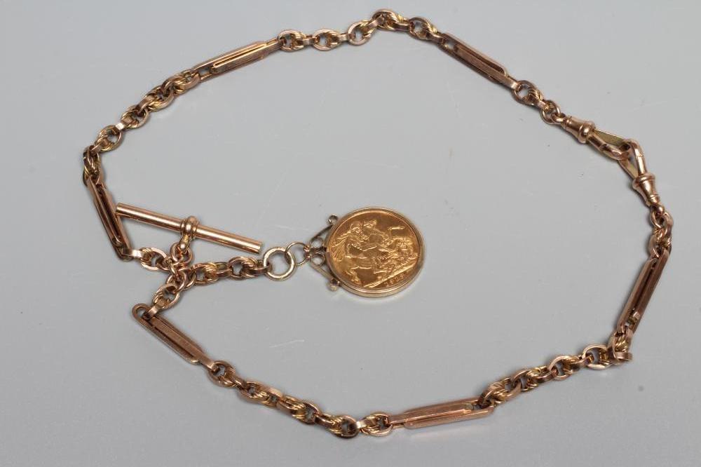 A GEORGE V SOVEREIGN, 1913, in a 9ct gold pendant loose mount, hung from a 9ct gold fancy watch Image