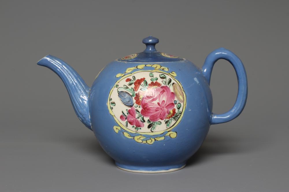 A STAFFORDSHIRE POLYCHROME SALTGLAZE STONEWARE TEAPOT AND COVER of globular form with crabstock Image