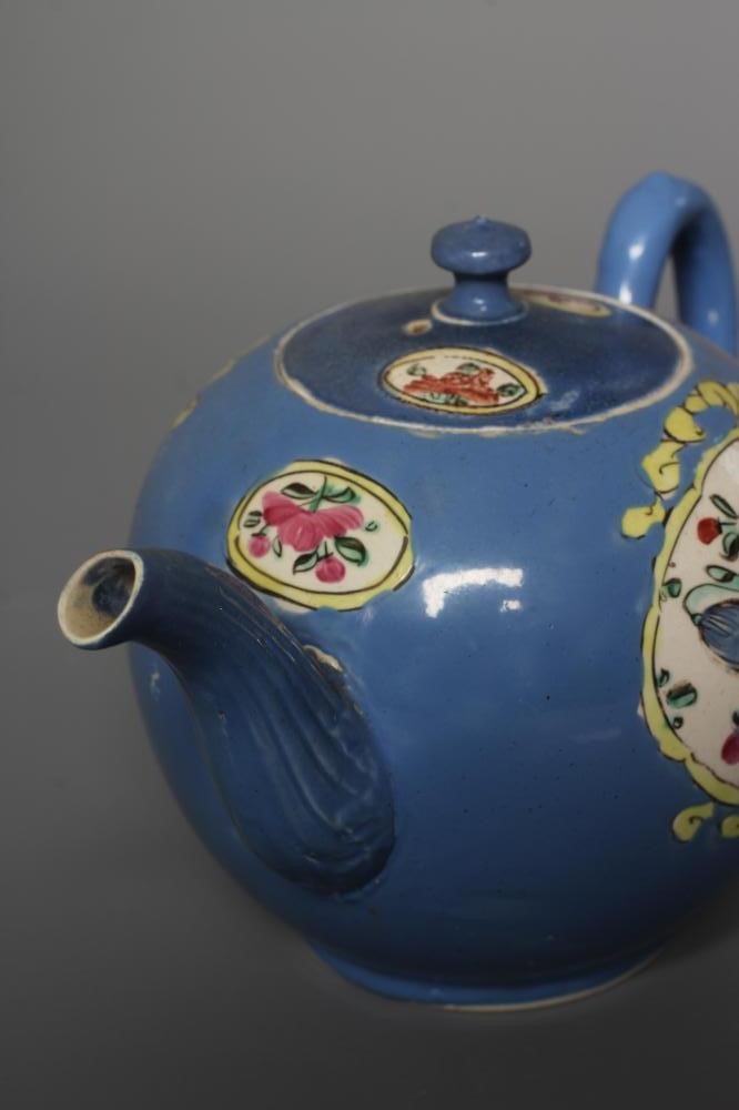 A STAFFORDSHIRE POLYCHROME SALTGLAZE STONEWARE TEAPOT AND COVER of globular form with crabstock Image