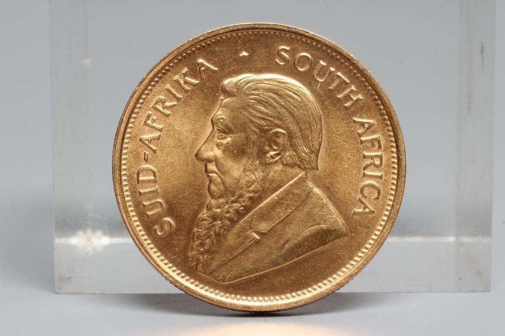 A GOLD KRUGERRAND, 1975, 1oz Fine Gold, 33.9g (Est. plus 20% premium) Image