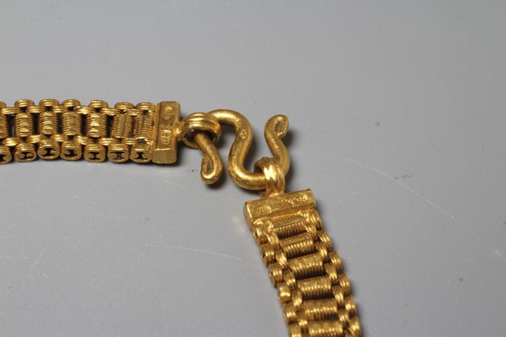 A THAI BRACELET stamped 96.5% TT, crown over KHL, with coiled wirework links and S loop fastener, Image