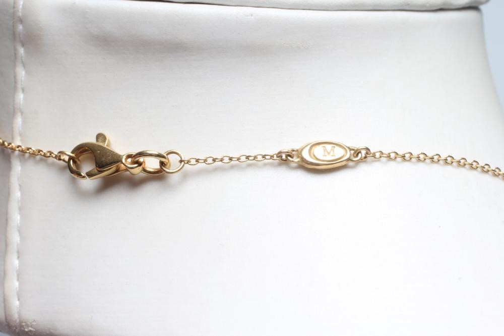 AN ITALIAN PENDANT stamped 750 * MIL, of abstract open oval form, on integral threaded chain stamped Image