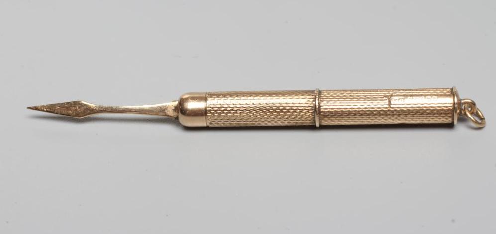 A 9CT GOLD PROPELLING TOOTHPICK, maker's mark rubbed, Birmingham 1964, with engine turning and Image
