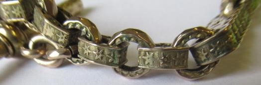 A VICTORIAN STARS AND BARS FANCY LINK WATCH CHAIN, with two dog-clip fasteners and bar, one clip Image