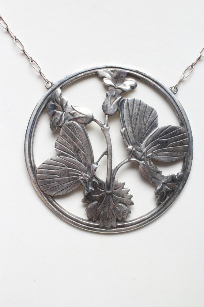 A GEORG JENSEN SILVER CIRCULAR MOONLIGHT BLOSSOM PENDANT designed by Arno Malinowski with two Image