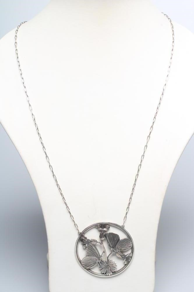A GEORG JENSEN SILVER CIRCULAR MOONLIGHT BLOSSOM PENDANT designed by Arno Malinowski with two Image