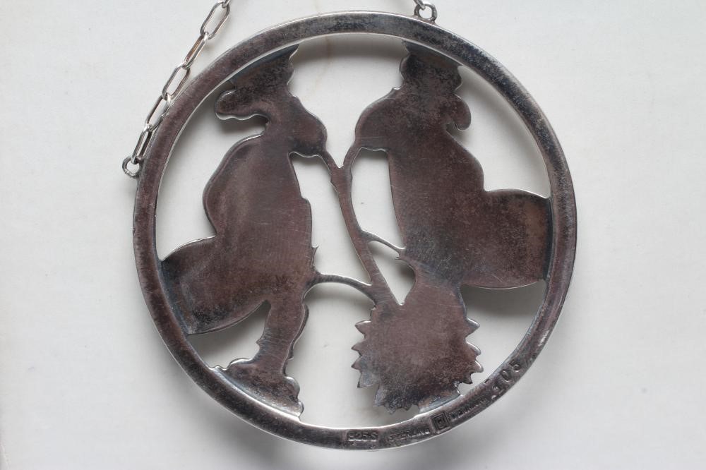 A GEORG JENSEN SILVER CIRCULAR MOONLIGHT BLOSSOM PENDANT designed by Arno Malinowski with two Image