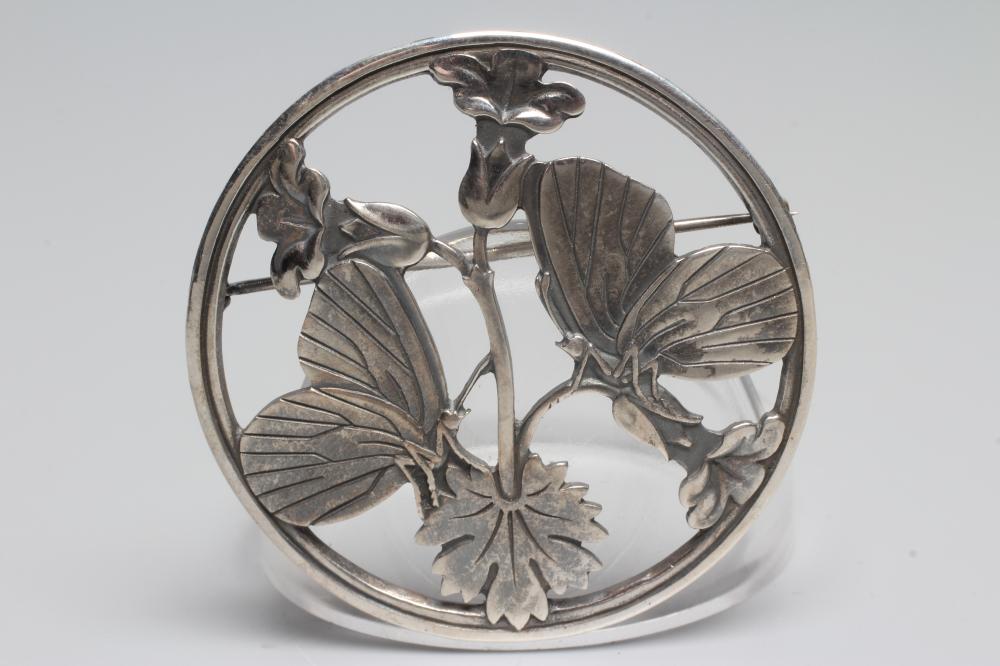 A GEORG JENSEN SILVER CIRCULAR MOONLIGHT BLOSSOM BROOCH designed by Arno Malinowski with two Image