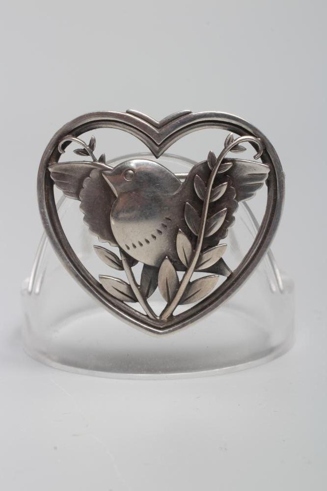 A GEORG JENSEN SILVER DOVE IN HEART BROOCH designed by Arno Malinowski, stamped GJ Sterling 239 Image