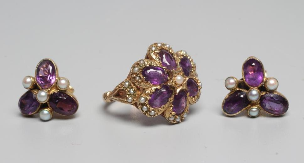 A VICTORIAN STYLE AMETHYST AND SEED PEARL CLUSTER RING Image