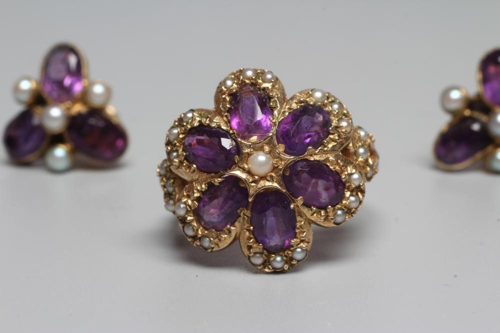A VICTORIAN STYLE AMETHYST AND SEED PEARL CLUSTER RING Image