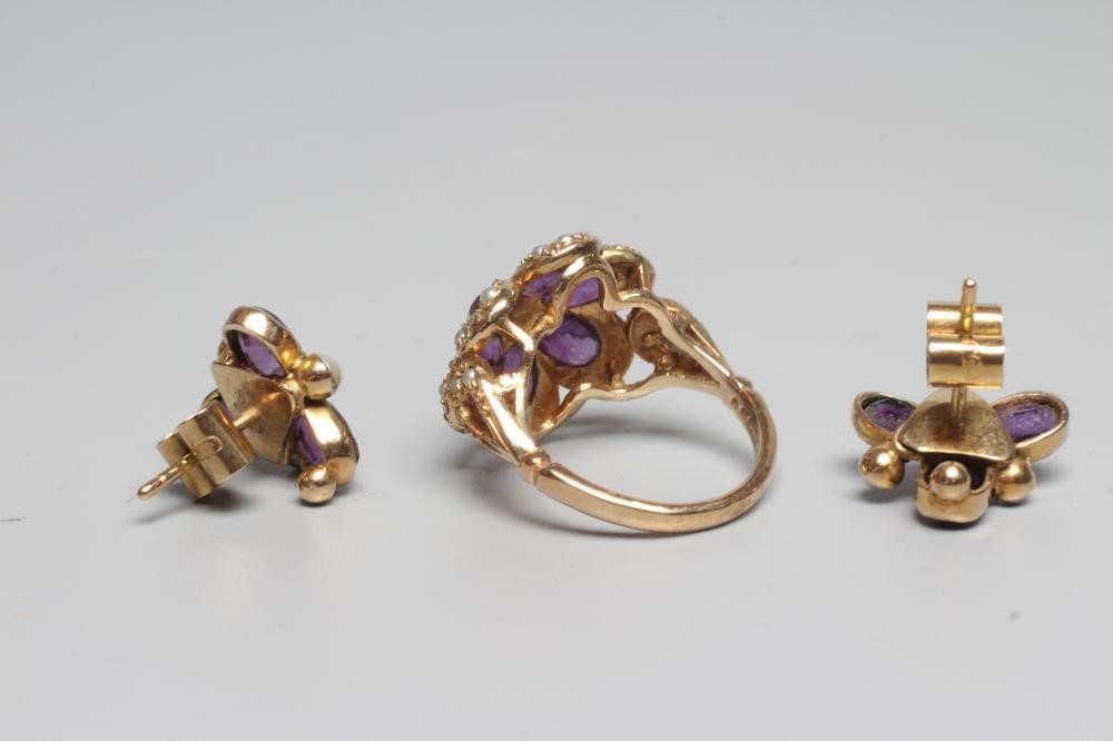 A VICTORIAN STYLE AMETHYST AND SEED PEARL CLUSTER RING Image