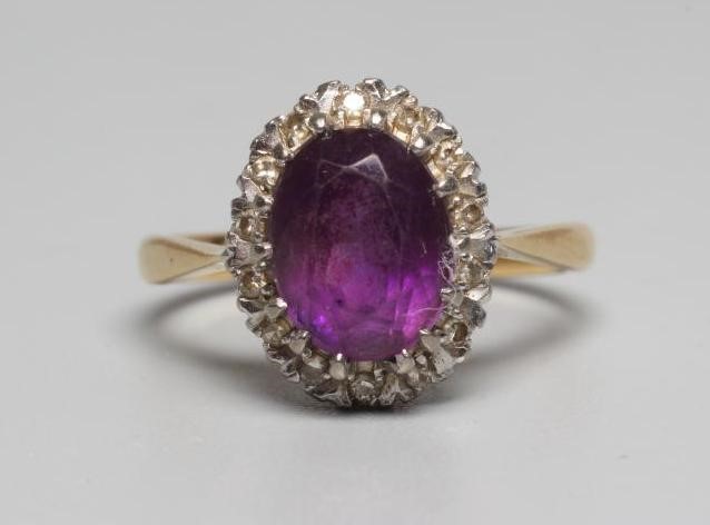 AN AMETHYST AND DIAMOND CLUSTER RING Image