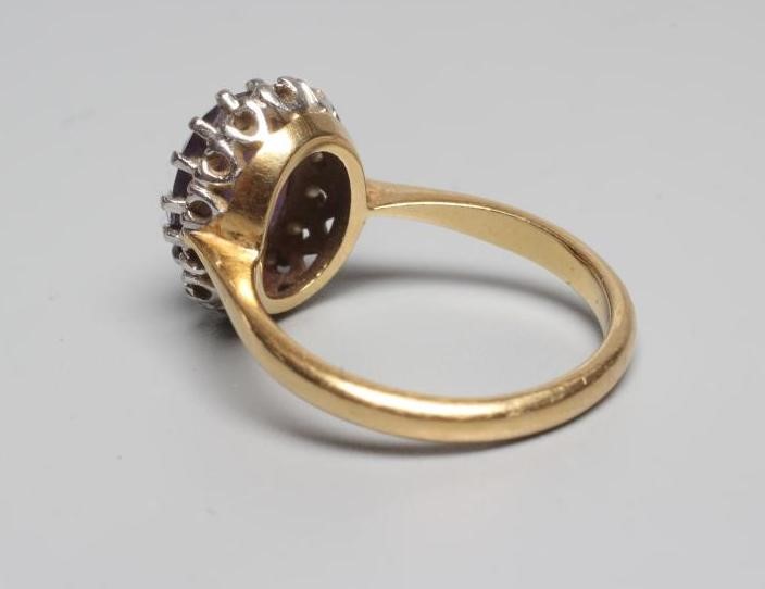 AN AMETHYST AND DIAMOND CLUSTER RING Image
