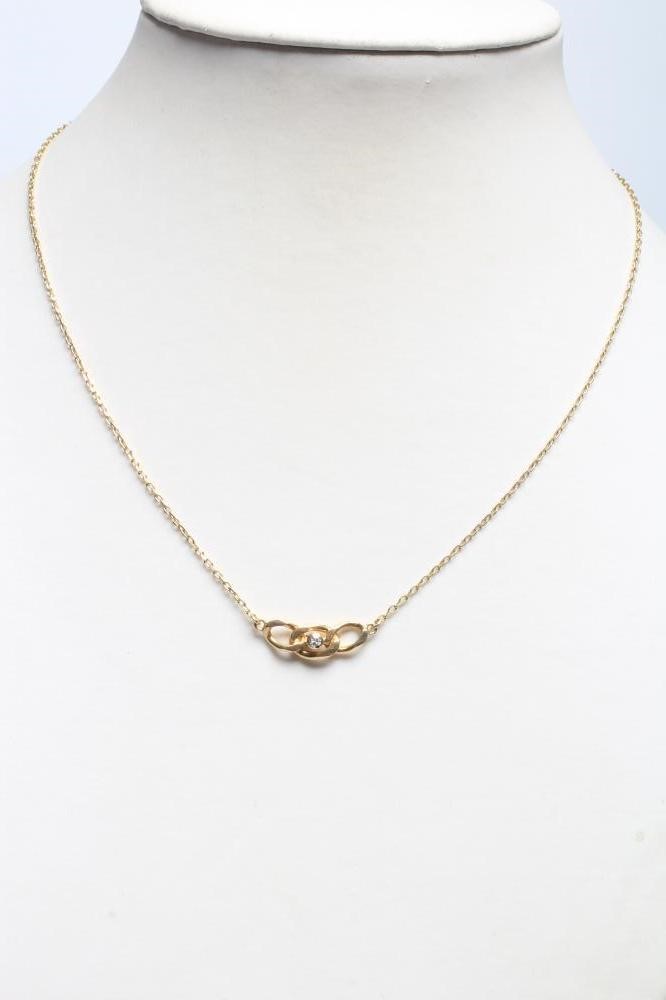 AN 18CT GOLD NECKLACE, the triple chain link 'pendant' centred by a small brilliant cut diamond Image