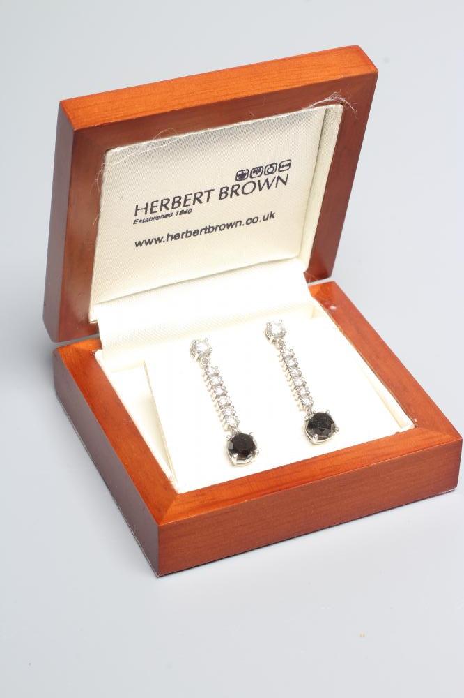 A PAIR OF DIAMOND DROP EARRINGS Image