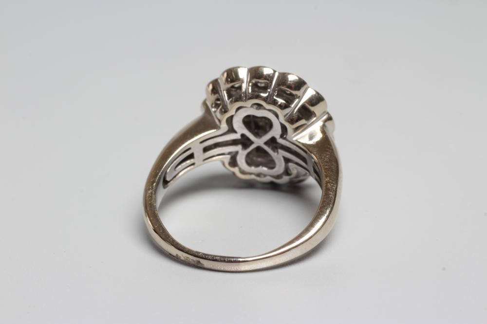 A DIAMOND CLUSTER PLAQUE RING Image