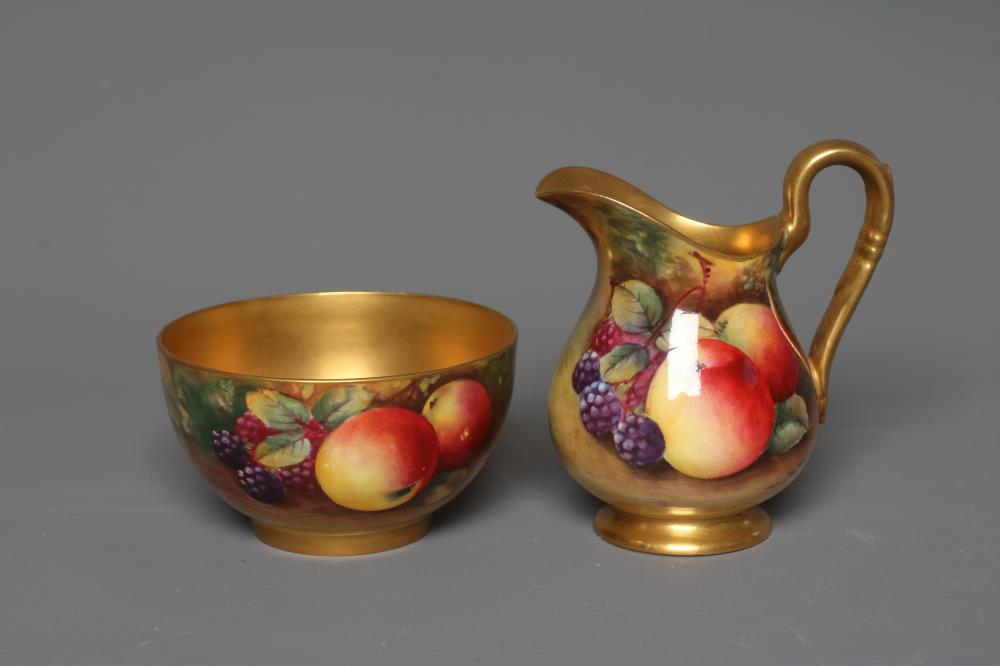 A ROYAL WORCESTER SUGAR BOWL AND MATCHING CREAM JUG Image