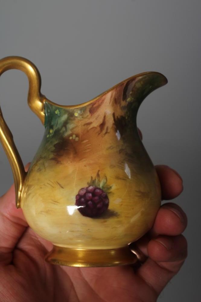 A ROYAL WORCESTER SUGAR BOWL AND MATCHING CREAM JUG Image