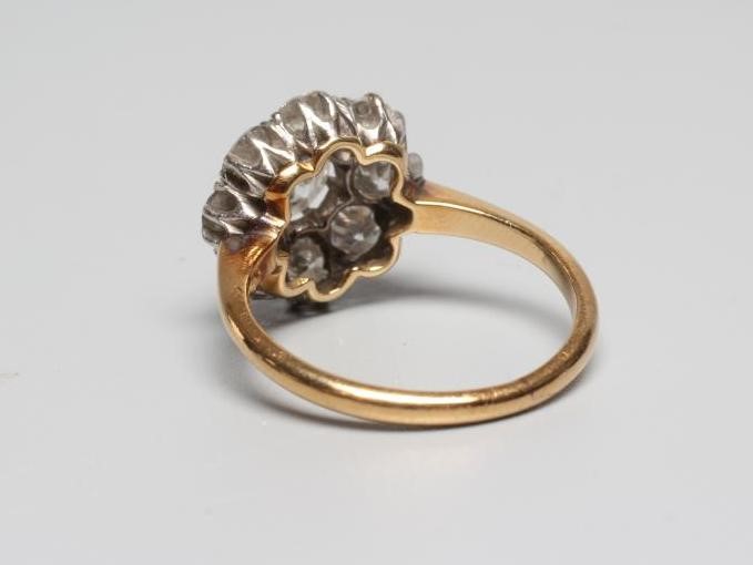 A NINE STONE DIAMOND CLUSTER RING Image
