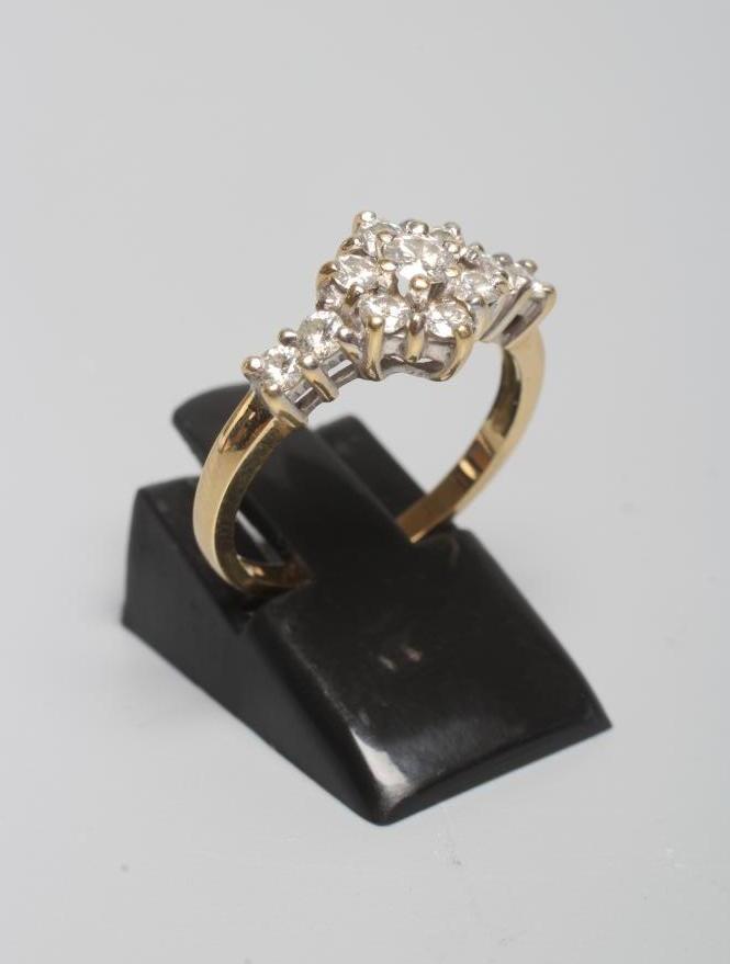 A DIAMOND CLUSTER RING Image
