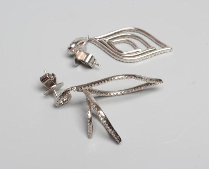 A PAIR OF DIAMOND DROP EAR STUDS Image