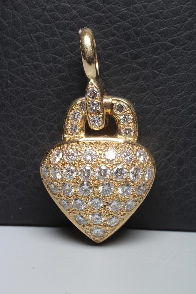 A DIAMOND PADLOCK PENDANT, the heart shaped panel pave set with numerous brilliant cut stones to a Image