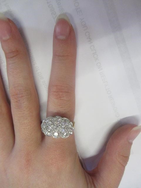 A DIAMOND CLUSTER DRESS RING Image