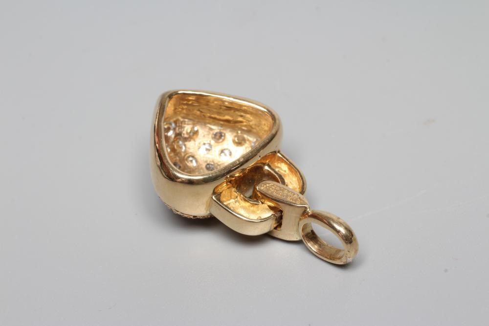 A SOLITAIRE DIAMOND RING, the old cut stone of approximately 0.6cts set to a plain white shank Image