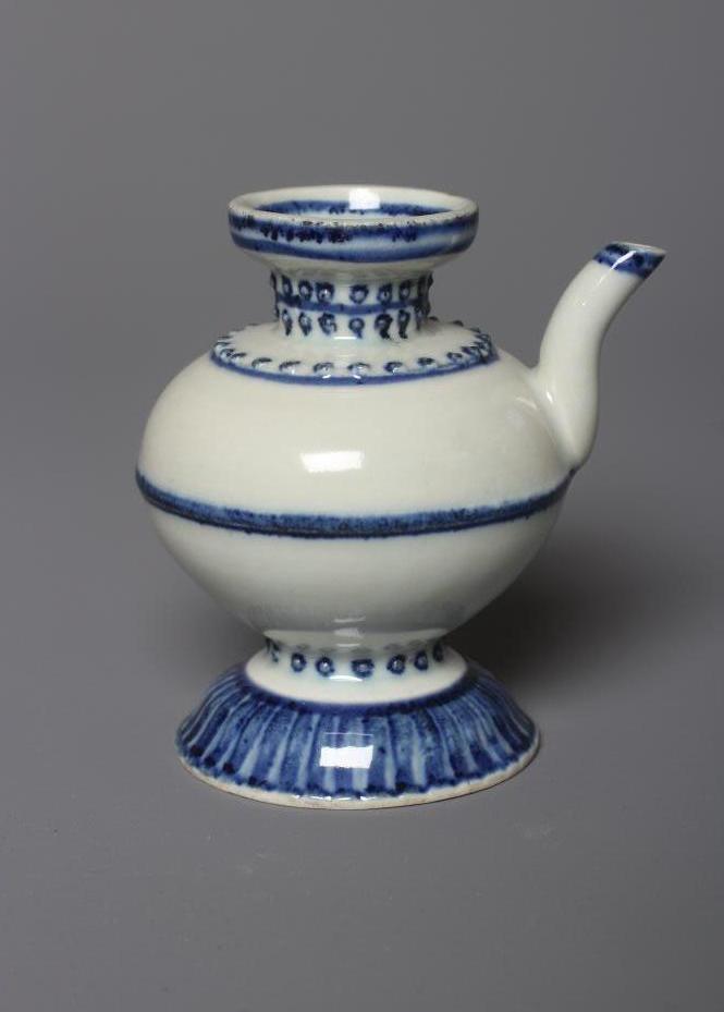 A CHINESE PORCELAIN WATER DROPPER of rounded double conical form, the shoulders moulded with dots Image